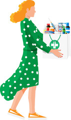 Woman holding drugstore bag