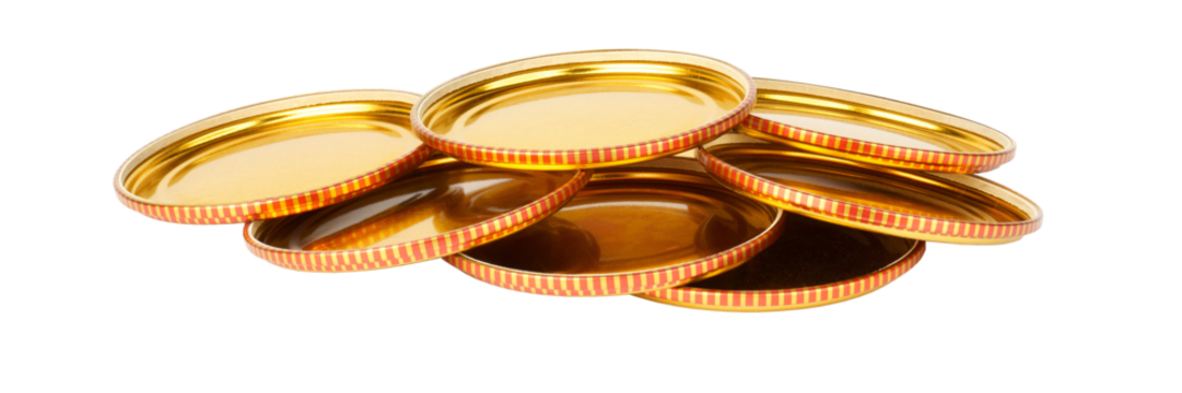 gold metal jar lids isolated on white background