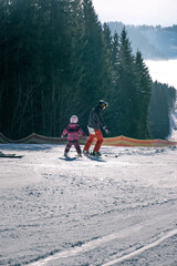 young family at ski slope
