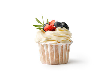 Vanilla cupcake with cream decorated with berries and green leaves isolated on white background.  Delicious homemade dessert. Festive bakery. - obrazy, fototapety, plakaty