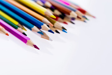 Group of color pencils isolated on white background