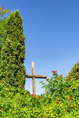 Christian church cross in high steeple tower for prayer