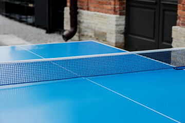 blue table tennis or ping pong.