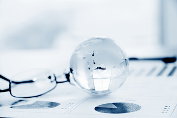 Globe glasses and diagram on table