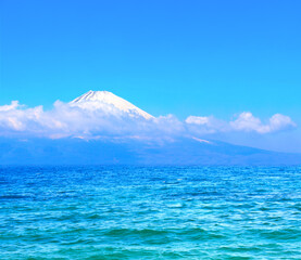 Fototapeta na wymiar Sacred Mount Fuji (Fujiyama) in clouds, Japan