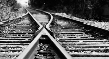 Two railway tracks merge together