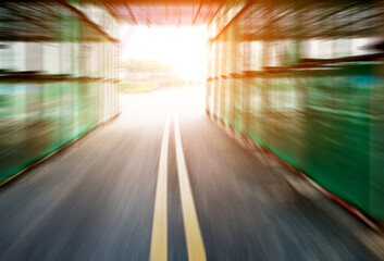 Motion blurred driving through the tunnel