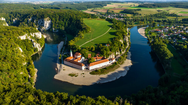 Germany, Bavaria, Kelheim, Aerial view of&nbsp;Weltenburg Abbey and surrounding landscape in summer
