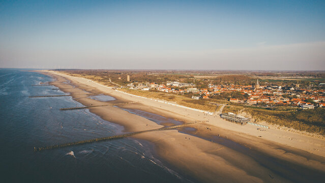 Aerial view of beach by city