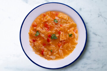 Menorcan soup. Traditional recipe from the island of Menorca in the Balearic Islands. Traditional tapas from the islands with bread, peppers and white cabbage.