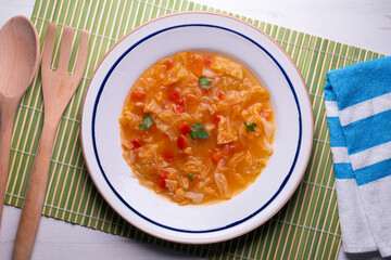 Menorcan soup. Traditional recipe from the island of Menorca in the Balearic Islands. Traditional tapas from the islands with bread, peppers and white cabbage.