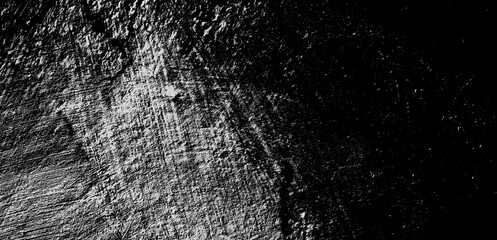 Black and white grunge texture. Black and white abstract distressed background. A faded surface covered with dirt, scratches, cracks.