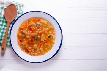 Menorcan soup. Traditional recipe from the island of Menorca in the Balearic Islands. Traditional tapas from the islands with bread, peppers and white cabbage.