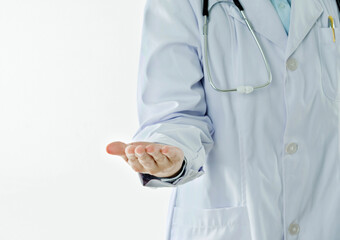 Doctor presenting blank palm of her hand isolated on white background