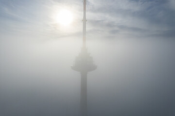 Aerial autumn beautiful morning fog view of Vilnius TV Tower, Lithuania