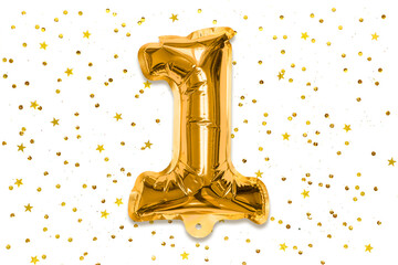 The number of the balloon made of golden foil, the number one on a white background with sequins. Birthday greeting card with inscription 1. Numerical digit, Celebration event, template.