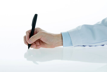 Male doctor hand holding a pen on white background