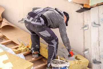 Building insulation. Glass wool is an insulating material made from fibres of glass arranged using...