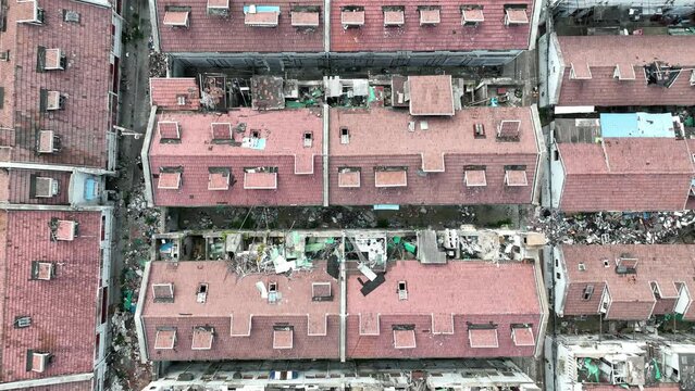 The traditional buildings waiting for demolition. Drone aerial view. The traditional Shikumen buildings waiting for tearing down.  Real estate, economy, business concept b-roll footage.