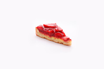 A piece of pie with strawberries. Isolated on white.