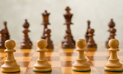Chess pieces on a chessboard - Focus on the pawns