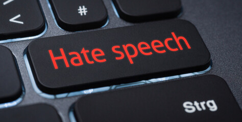  Illuminated keyboard with a labeled key - Hate speech