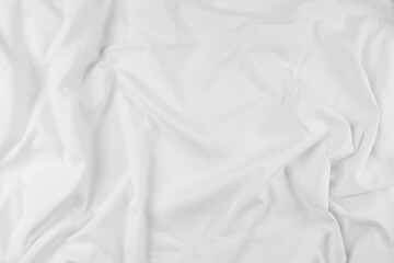 White fabric. luxurious white fabric texture background. Creases of satin, silk, and cotton.