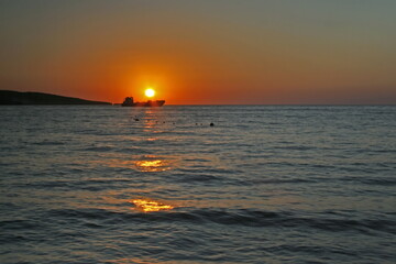 sunset over the ship