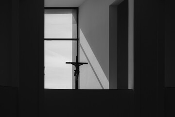 silhouette of a window in a church