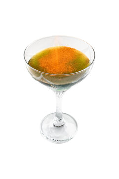Cocktail with paprika in dessert glass isolated object shot against white background