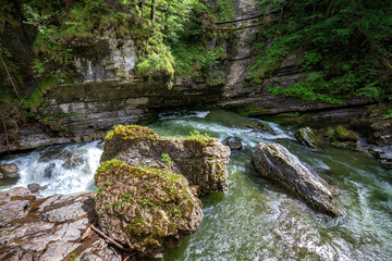 Naklejka na ściany i meble River Breitach with big rocks in a gorge at Breitachklamm, Germany