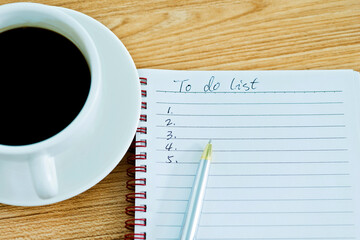 To do list with pen and coffee