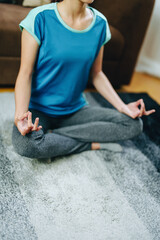 stress relief, muscle relaxation, breathing exercises, exercise, meditation, portrait of Young Asian woman relaxing her body from office work by practicing yoga by watching online tutorials