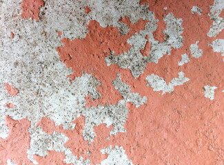 Old wall background - city building decay texture. Urban decline pattern with peeling paint.