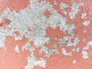 Old wall background - city building decay texture. Urban decline pattern with peeling paint.