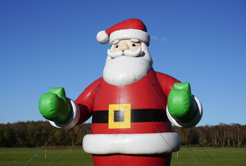 Inflatable Santa decoration for outdoor garden use. Father Christmas blow up figure 