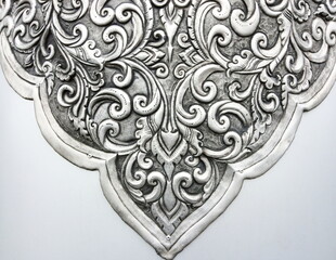 The art and pattern of carving silverware.