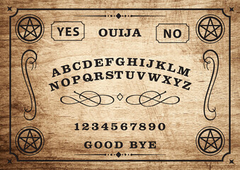 Ouija Board Planchette on wooden texture. Halloween play with calling souls and demons. Party...