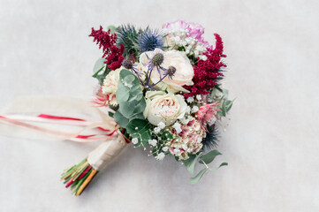 horizontal shot of bridal bouquet for autumn wedding on white background