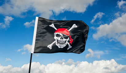 Pirate flag waving on sky