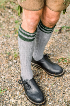 Close up shot of man wearing traditional bavarian socks and shoes   in Oktoberfest