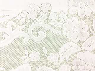 White lace isolated on brown background