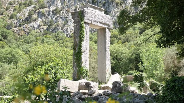 Ruins of ancient temple of Hadrian, Termessos ancient city in Turkey. Anatolia heritage ruins in Taurus Mountains