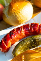grilled sausage with pickles