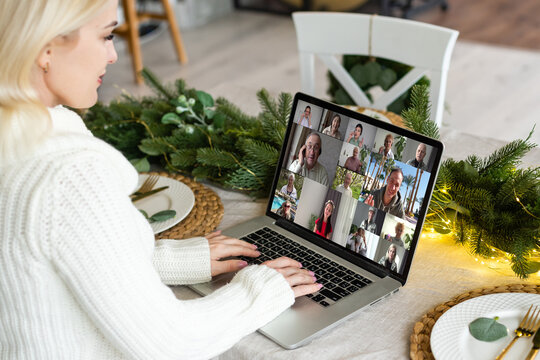 Virtual Christmas Tree Meeting Team Teleworking. Family Video Call Remote Conference. Laptop Webcam Screen View. Team Meet Working From Their Home Offices. Happy Hour Party Online Woman