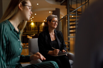 Female executive using digital tablet in office