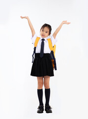 Back to school. Asian junior school student in uniform posing on white background.