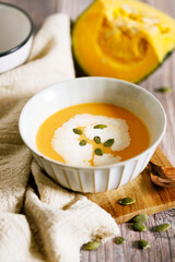 Pumpkin soup with pumpkin seeds and cream