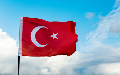 Turkish flag waving on sky