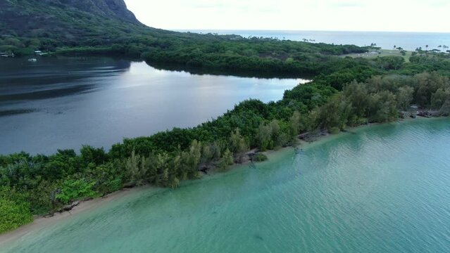 Flying above the natural wall between the ocean and traditional Hawiian fishpond